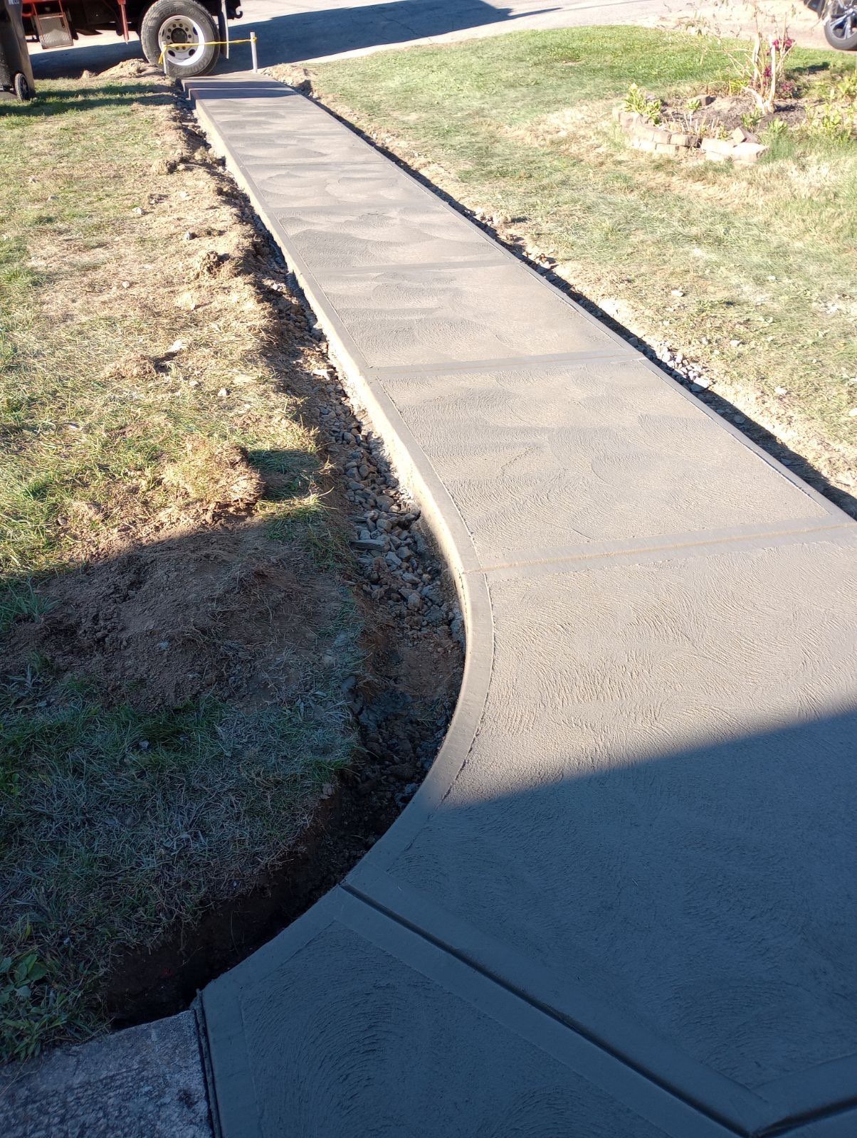 Broom-finish concrete walkway