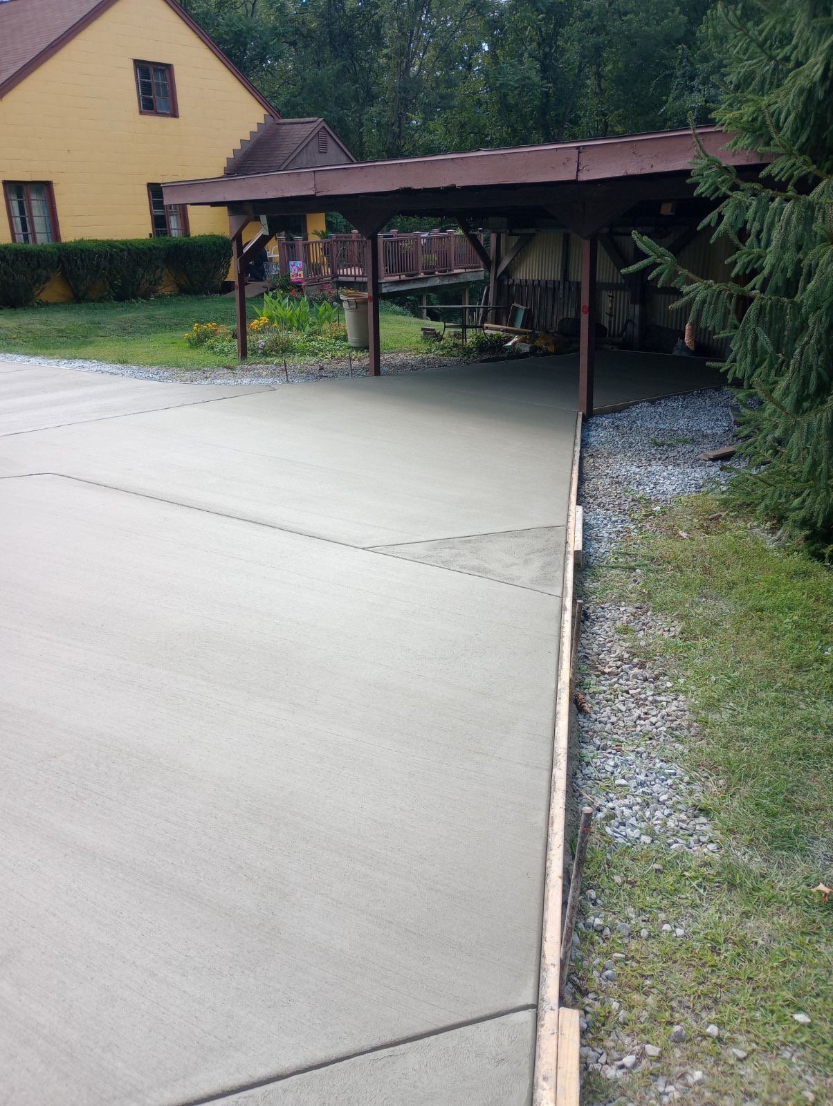 Concrete driveway and carport approach
