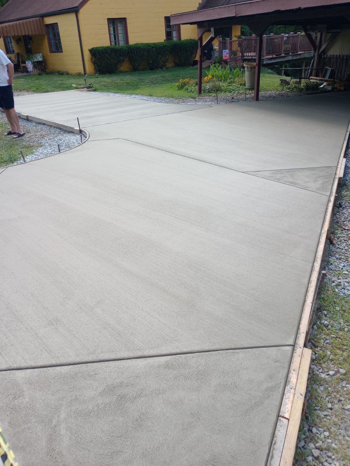 A finished residential concrete driveway poured by A-1 Solid
