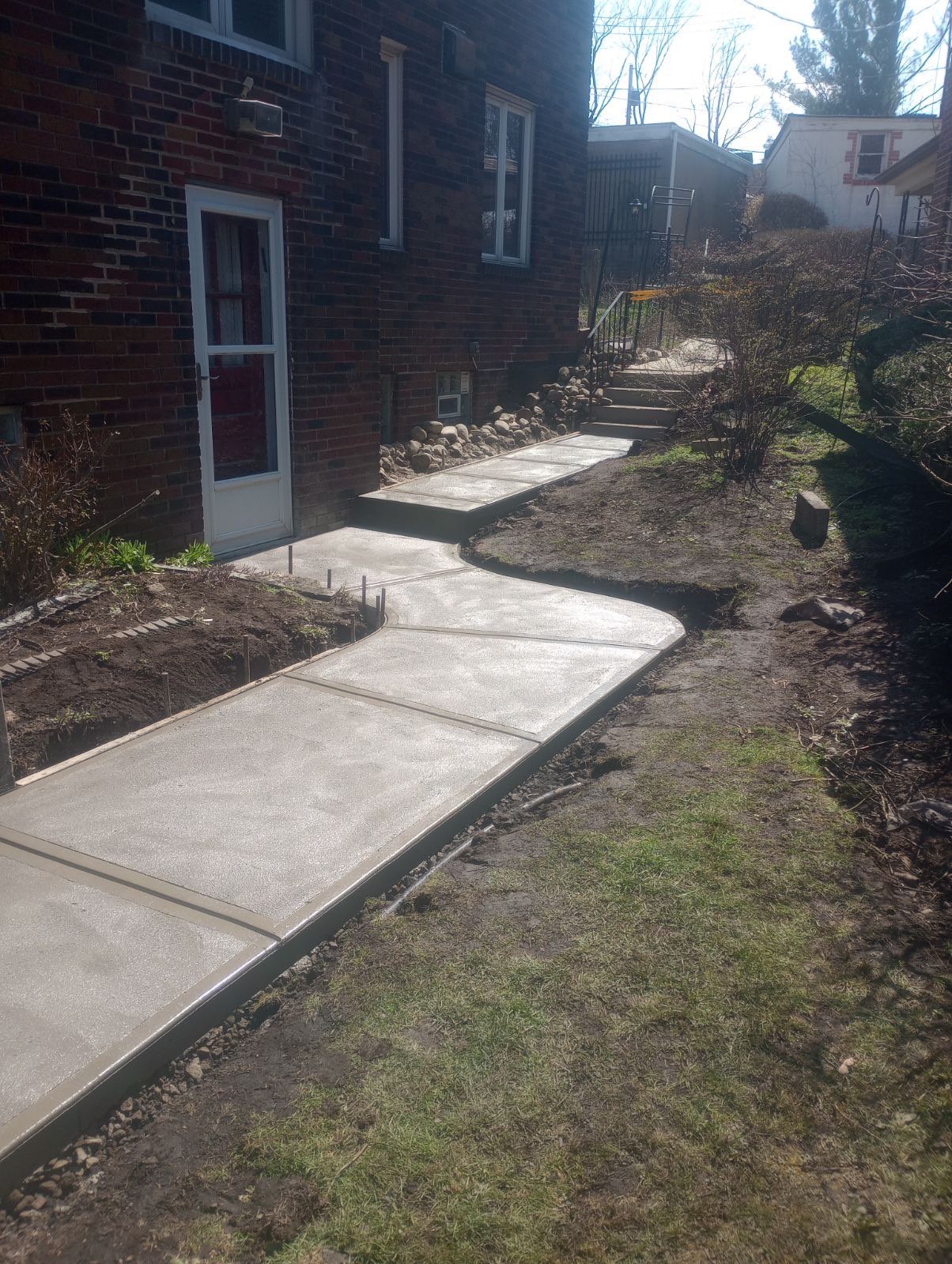 Side-yard concrete walkway